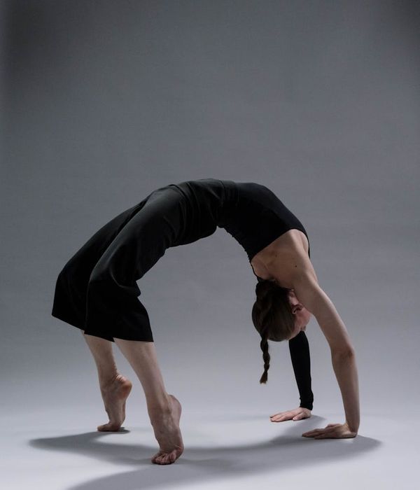Person practicing gentle yoga movements for body flexibility